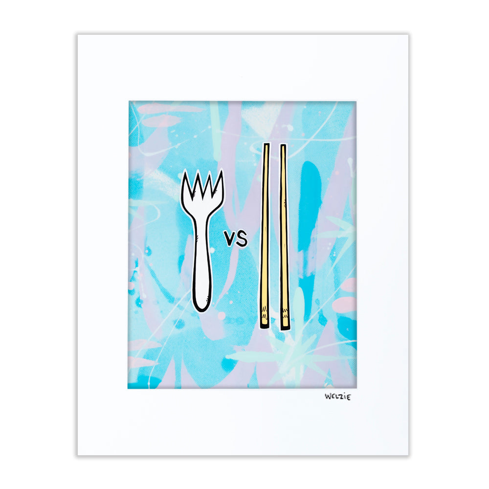 A fork and a pair of chopsticks illustrated side by side with "VS" lettering — matted fine art print by Maui artist Welzie