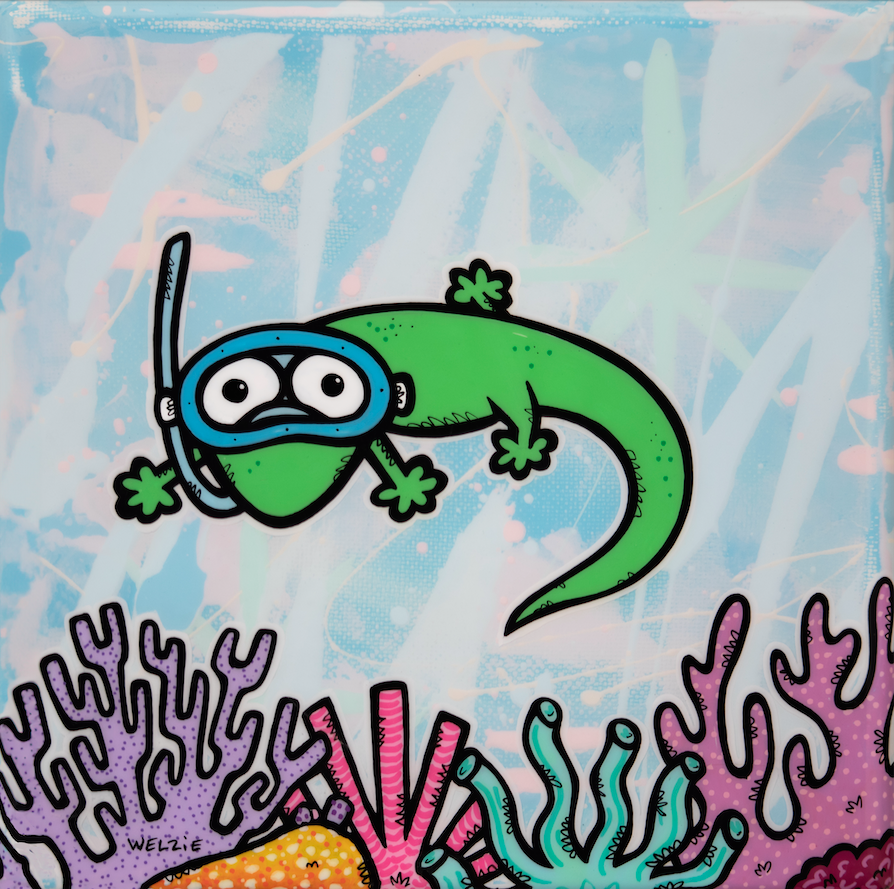 Green gecko wearing a snorkel mask over a colorful coral reef — aluminum reproduction by Maui artist Welzie