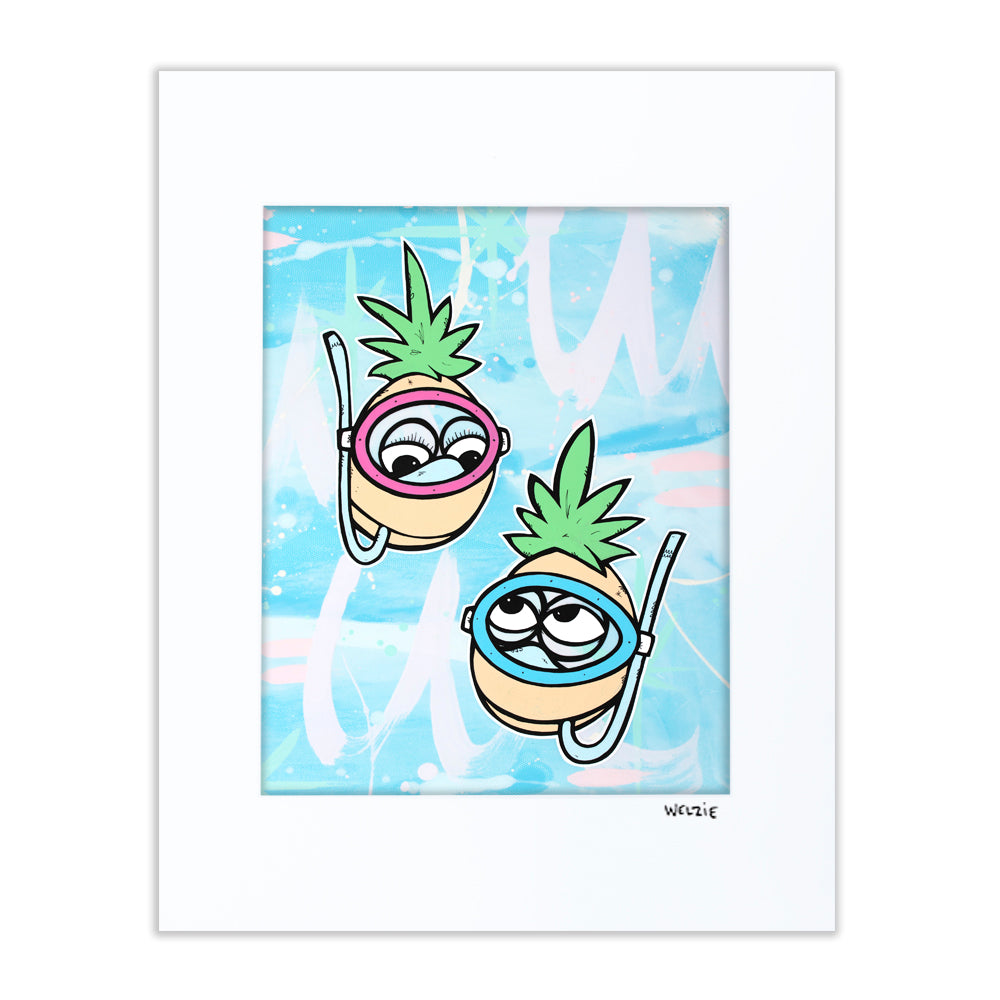 Two pineapple characters wearing snorkel masks side by side — matted fine art print by Maui artist Welzie