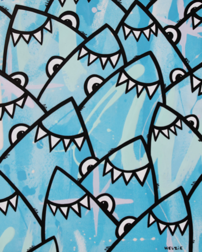 A group of shark characters swimming together in a lively pattern — aluminum reproduction by Maui artist Welzie