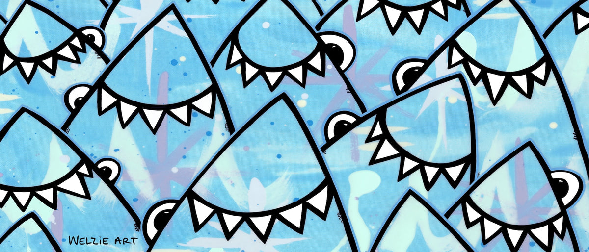 Quick Dry Towel with reapeating pattern of sharks.
