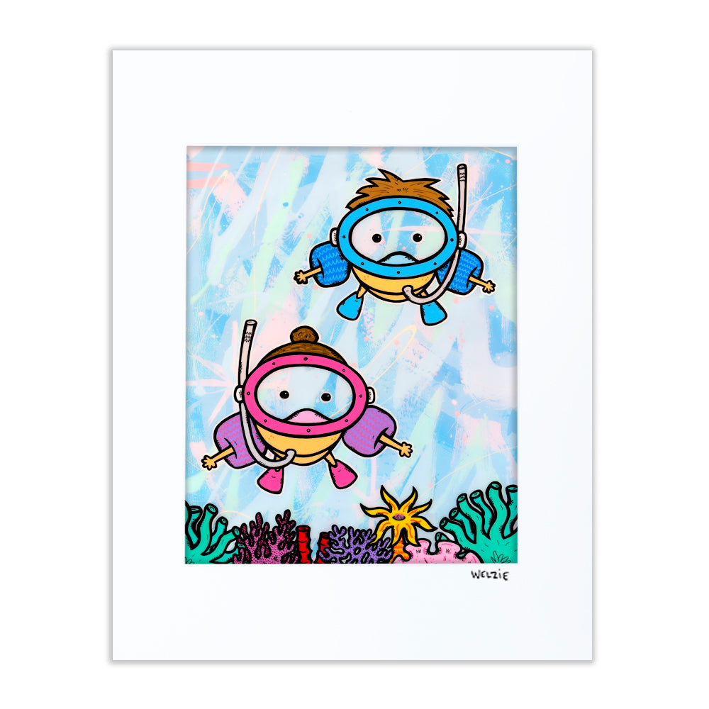 Two round snorkeling characters with masks swimming over a colorful coral reef — matted fine art print by Maui artist Welzie