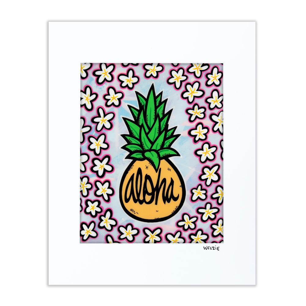 Pineapple with "aloha" lettering, framed by a border of white plumeria flowers — matted fine art print by Maui artist Welzie