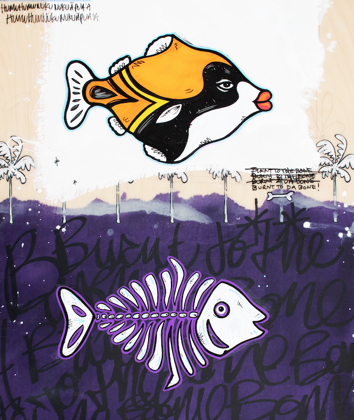 Fish skeleton alongside a colorful fish against a dark purple background — aluminum reproduction by Maui artist Welzie