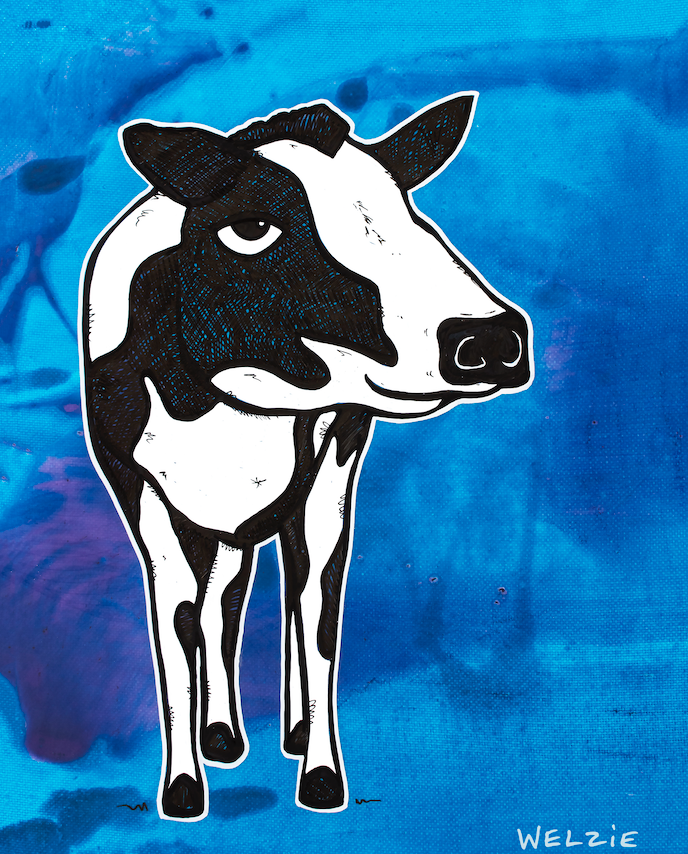 Smiling black and white cow wearing a flower lei — aluminum reproduction by Maui artist Welzie
