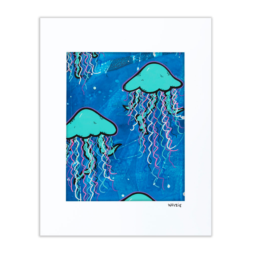 Teal jellyfish floating against a deep blue background — matted fine art print by Maui artist Welzie