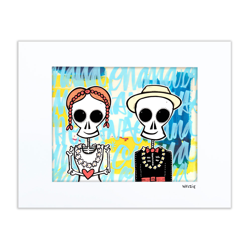 Two skeleton figures dressed in Hawaiian attire, Day of the Dead style — matted fine art print by Maui artist Welzie