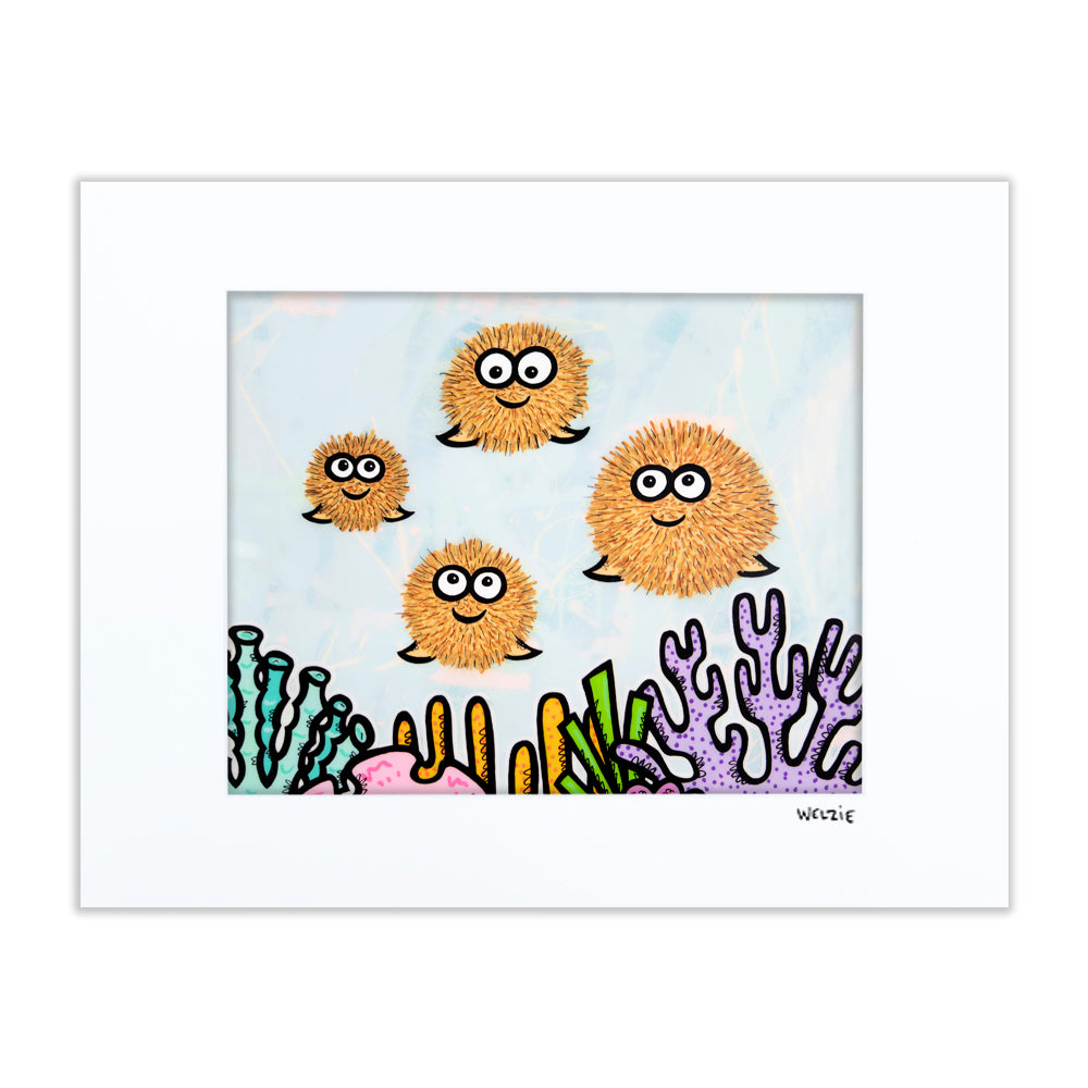 Four round pufferfish characters with big expressive eyes — matted fine art print by Maui artist Welzie