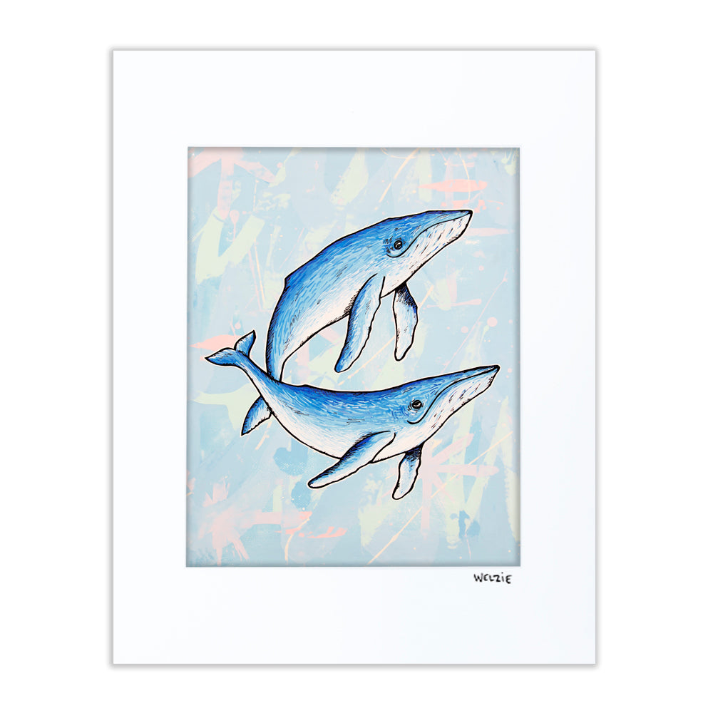 Two whales swimming together in soft blue tones — matted fine art print by Maui artist Welzie