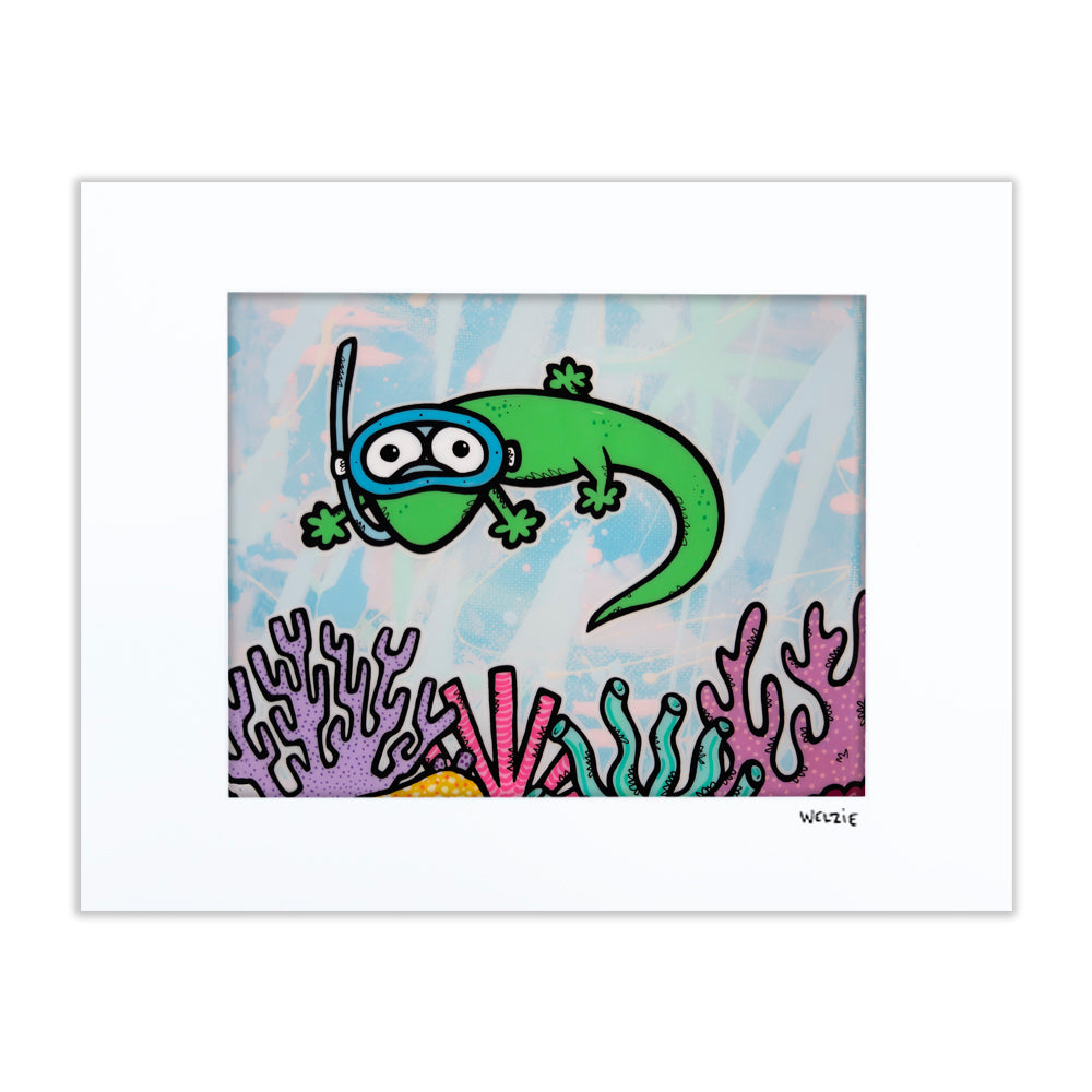 Green gecko wearing a snorkel mask over a colorful coral reef — matted fine art print by Maui artist Welzie