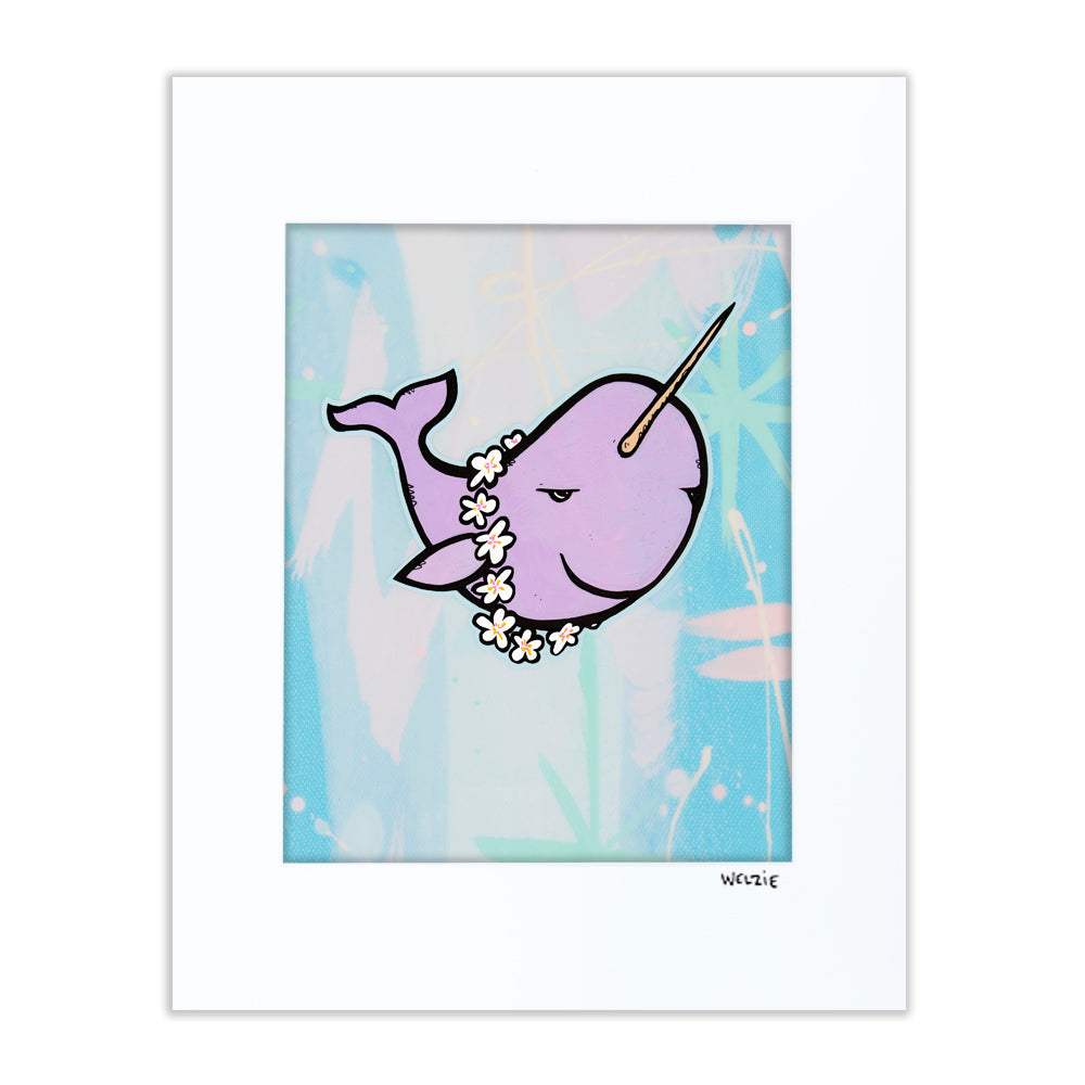 A narwhal with its spiraled tusk swimming through blue water — matted fine art print by Maui artist Welzie